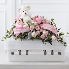 The FTD Touch of Sympathy Casket Spray