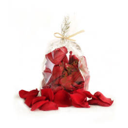 Clear gift bag filled with red rose petals and tied with a ribbon