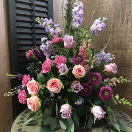 Mixed bouquet of pink, lavender, and purple flowers