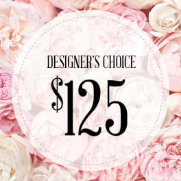 Pink and white roses with a "Designer’s Choice $125" label