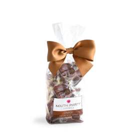 Bag of caramel candies tied with a large brown bow