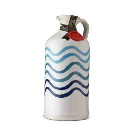 White ceramic jug with blue wave stripes and a red seal