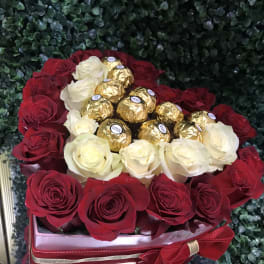 Heart-shaped rose arrangement with Ferrero Rocher chocolates