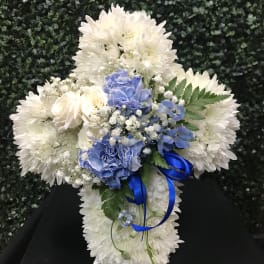 White chrysanthemum bouquet with blue carnations and ribbon