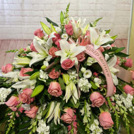 Large pink and white floral spray with lilies and roses