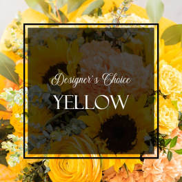 Yellow floral arrangement with sunflowers and roses
