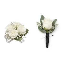 White rose bouquet and matching boutonniere with green leaves