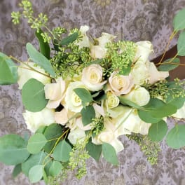 Bouquet of white roses with eucalyptus greenery