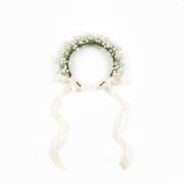 White floral crown with long cream ribbons