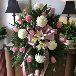 Pink and white funeral spray
