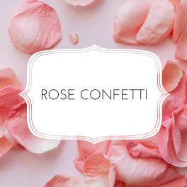 Pink rose petals around a label reading Rose Confetti