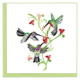 Quilled hummingbirds with red flowers on a white card with a green border