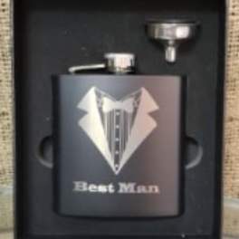 Gift set with a black flask and funnel in a display box