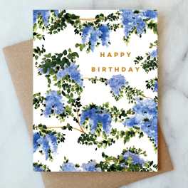 Birthday card with blue floral watercolor pattern and gold text