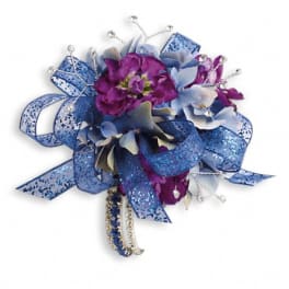 Blue and purple floral corsage with glittery ribbon and jeweled accents