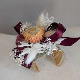 Gold band with dried corsage wt/c/burg
