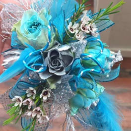 Blue and silver bouquet with roses and small white flowers