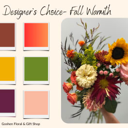 Mixed bouquet with a sunflower, roses, and mums in warm fall colors