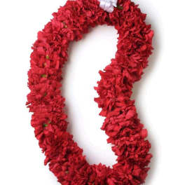 Red floral lei with a white ribbon bow