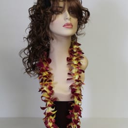 Mannequin wearing a graduation cap and orchid lei