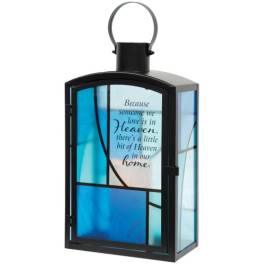Blue glass memorial lantern with a sympathy quote