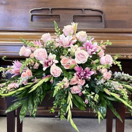 All pink casket spray