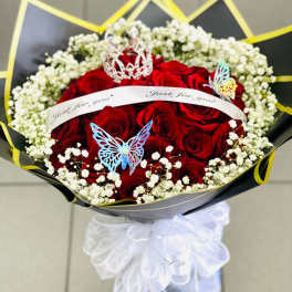 Red rose bouquet with white baby's breath and decorative butterflies