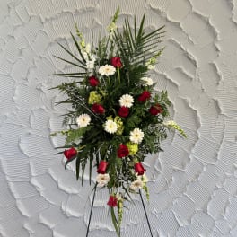 Standing floral spray with red roses and white daisies