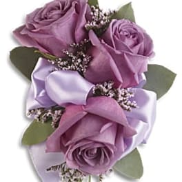 Lavender rose bouquet with satin ribbon and small filler flowers