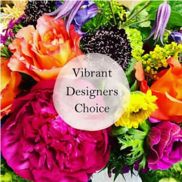 Colorful mixed bouquet with roses, lilies, and daisies