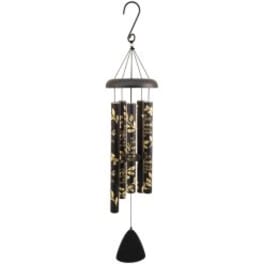 Hanging wind chime with patterned metal tubes and a black clapper