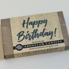 Birthday candy gift box on a white surface