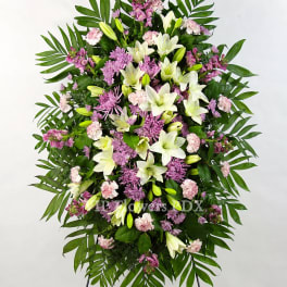 Standing floral spray with white lilies and pink flowers