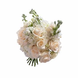 Cream rose bridal bouquet with white flowers and green accents
