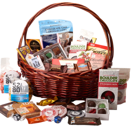 Basket filled with assorted chocolates and candy packages