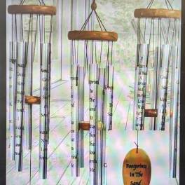 Hanging metal wind chimes with wooden tops and printed tubes