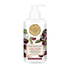 Bottle of dark cherry hand and body lotion with a pump dispenser
