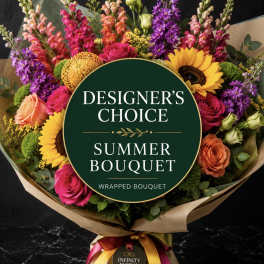 Wrapped bouquet with sunflowers, roses, and colorful snapdragons