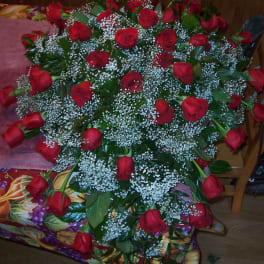 Large bouquet of red roses with baby's breath