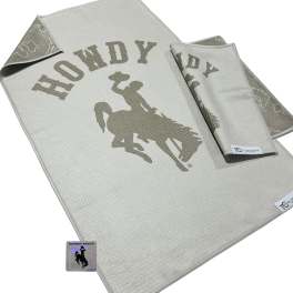 Gray towel set with a cowboy rider graphic and "Howdy" text
