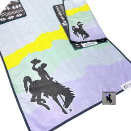 Pastel striped towel with black horse-and-rider silhouettes