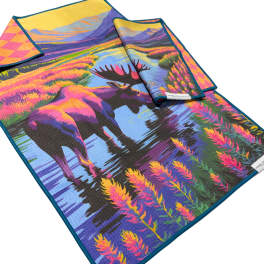 Colorful printed towels with a moose and mountain scene