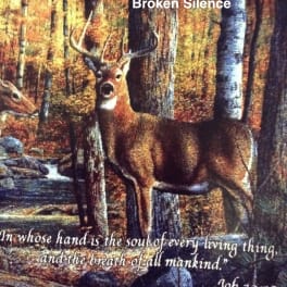 Printed wall hanging with a deer in an autumn forest and text.
