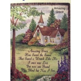 Decorative wall hanging with a church scene and the words "Amazing Grace"