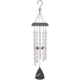 A hanging metal wind chime with silver tubes and a dark top and clapper