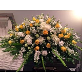 Large yellow and white floral casket spray