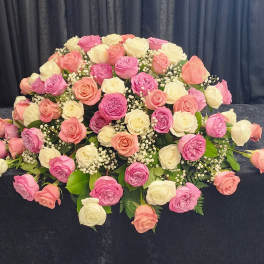 Large bouquet of pink, peach, and white roses