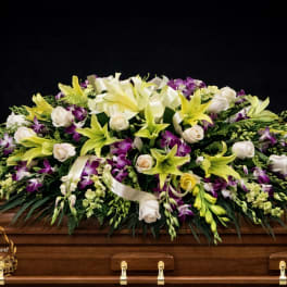 Orchid and Lily casket spray (FC10)