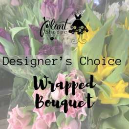 Wrapped bouquets of pink and yellow tulips with a florist logo overlay