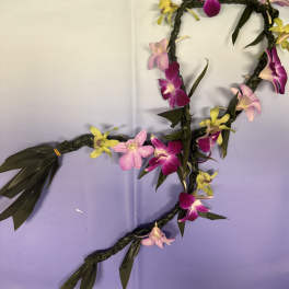 Braided floral garland with pink, purple, and yellow orchids